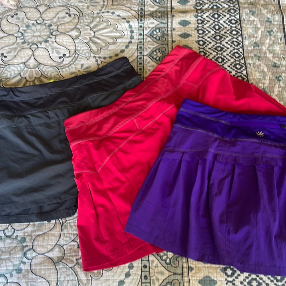 Athleta runaround running or tennis skirts. EUC. size S